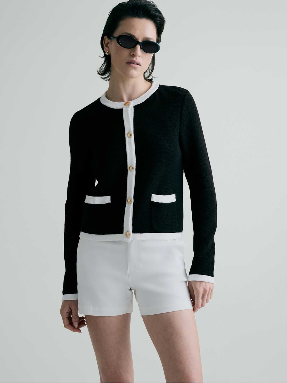 Quince Cotton Black Cardigan Jacket with White Trim and Gold Buttons